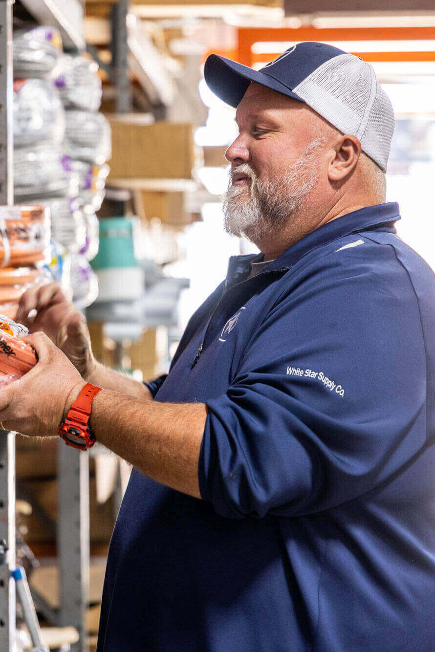 Team Member Looking at Items